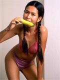 Naughty asian eats banana and open her pussy