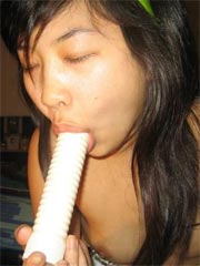 Sweet Asian teen playing with toys and her shaved pussy at home